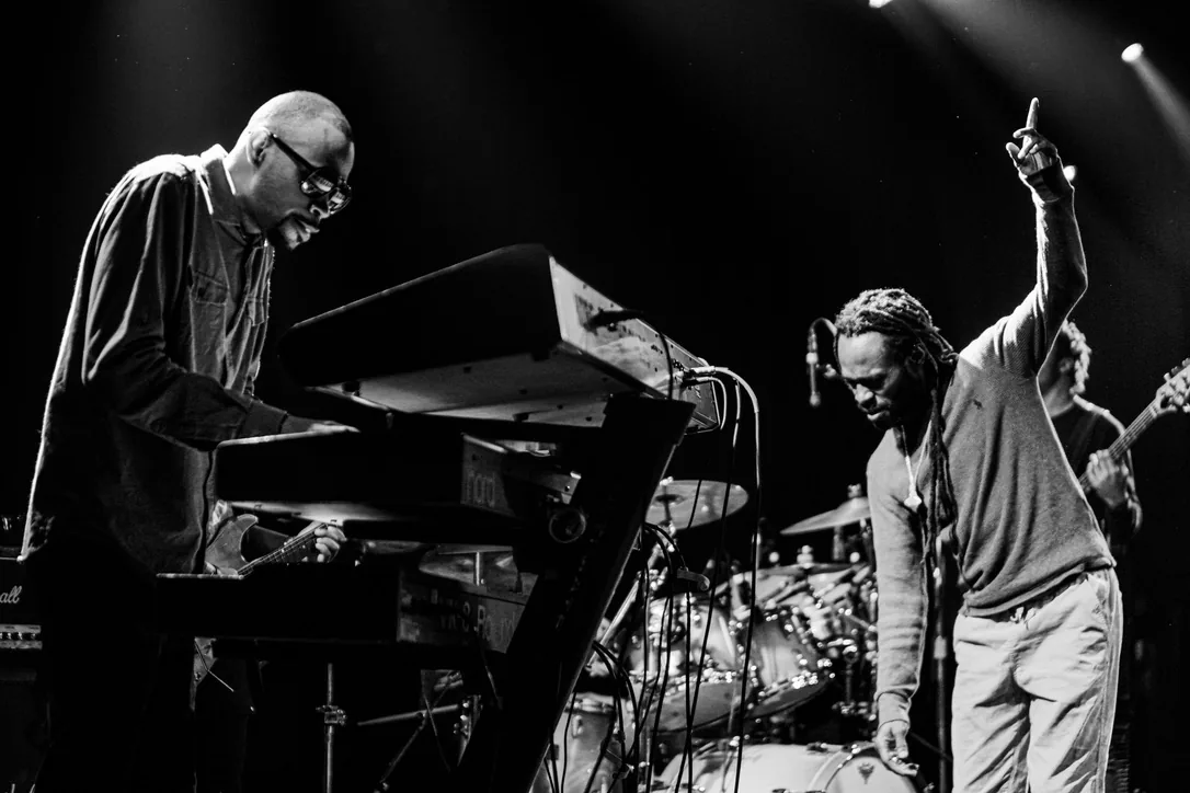 Live keyboard and vocal performance with Jesse Royal in California, photographed in black and white